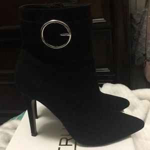 Black Ankle Bootie with silver “buckle”